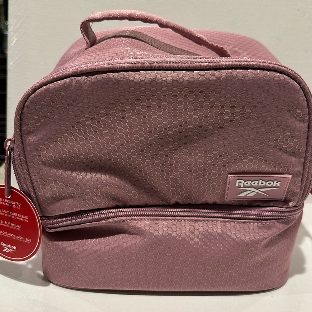 NWT Reebok Pink Insulated Lunch Bag w/durable care fabric and two compartments.